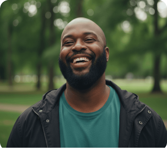 Man smiling outdoors